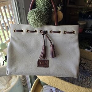 Dooney & Bourke Cream Pebble Leather Drawstring Tote with Brown Trim